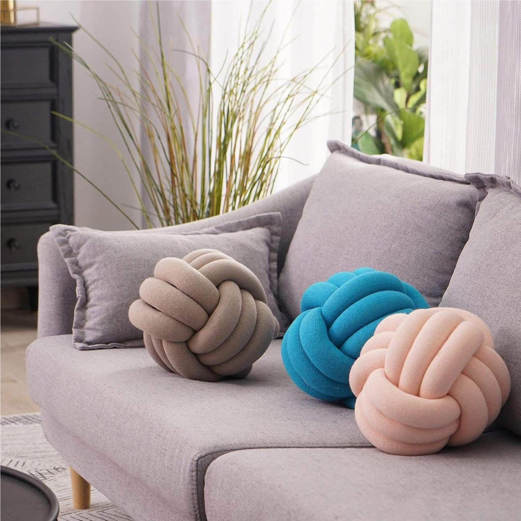 Cojín para sofá en forma de nudo